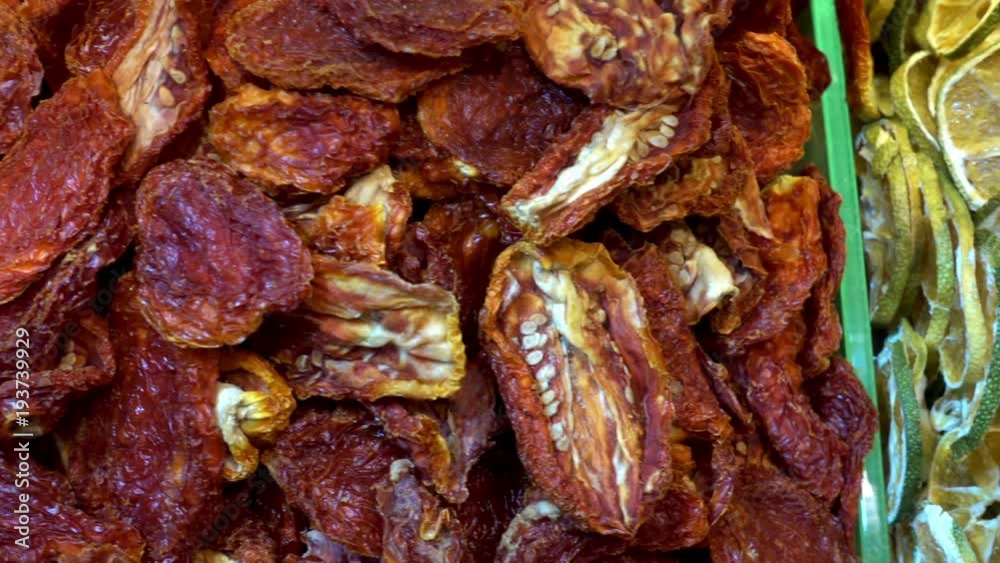 Dried peppers, oranges and other vegetables and fruits in a box on the counter. HD video clip Dried peppers, oranges and other vegetables and fruits in a box on the counter. HD video clip