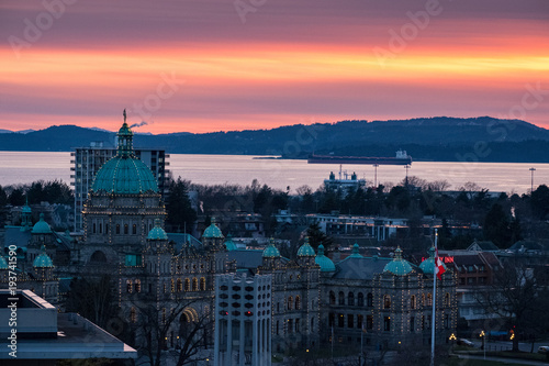 Photography A colorful sundown over downtown Victoria, BC with buildings and a colorful sky