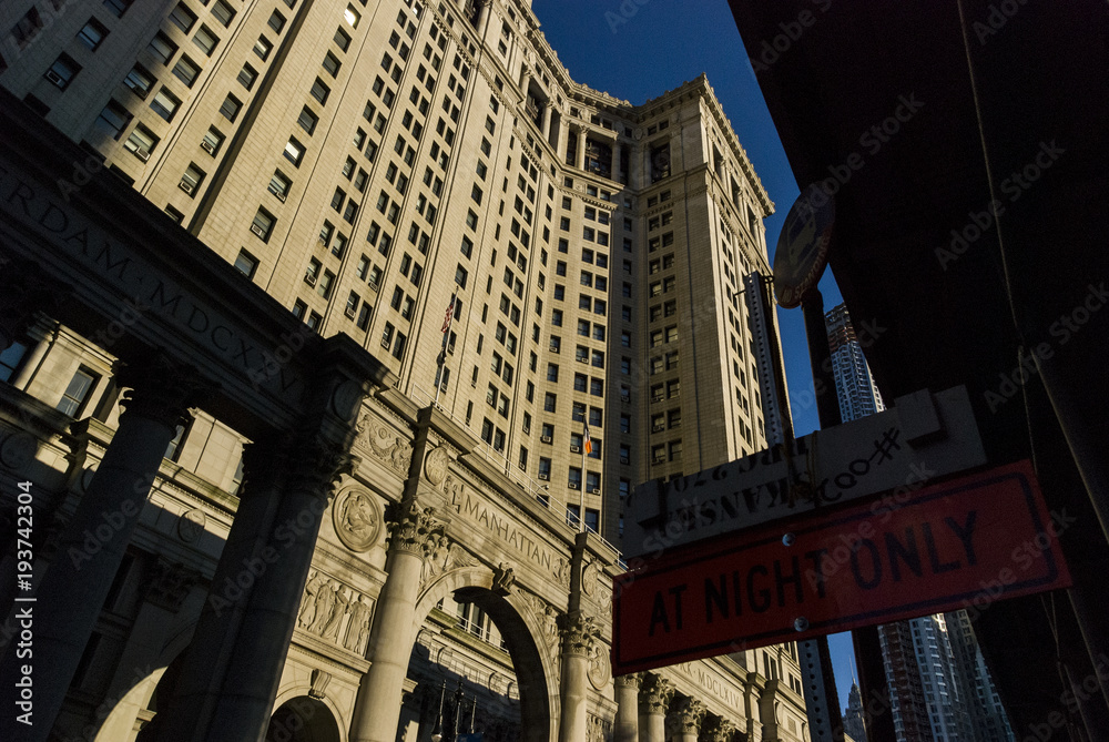 Naklejka premium New York City Hall building harsh contrast shadows architecture perspective.