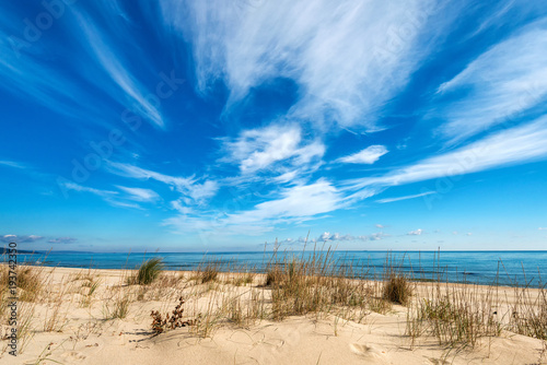 Fototapeta Naklejka Na Ścianę i Meble -  Seascape with dramatic blue sky and clouds