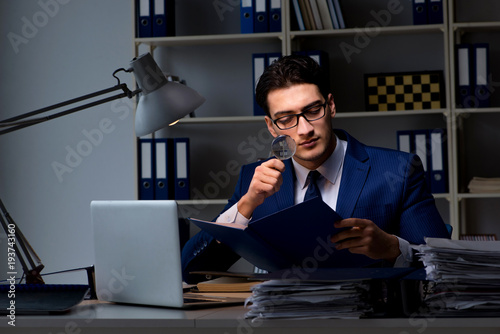 Wallpaper Mural Auditor looking for errors in financial reporting for company Torontodigital.ca