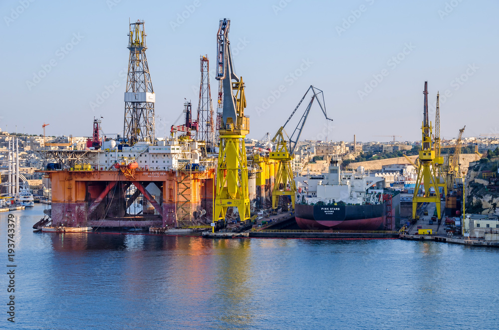 Commercial port of Valletta with cranes