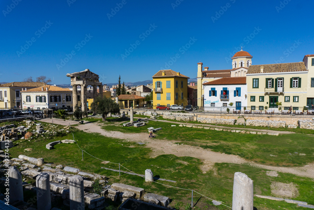 Obraz premium Roman market (agora) below in Athens Greece. Located to the north of the Acropolis and to the east of the Ancient Agora