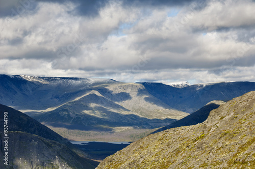 Khibiny Mountains, Kola Peninsula, Russia. Behind the Polar Circle. Some snow on mountains` tops.