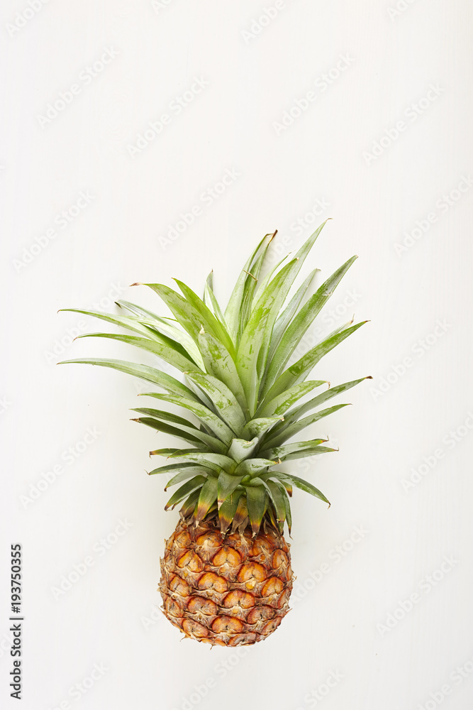 Summer concept Pineapple white wood