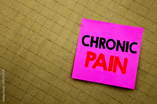 Handwritten text caption showing Chronic Pain. Business concept writing for Feeling Bad ill Care written on sticky note paper on the yellow background.