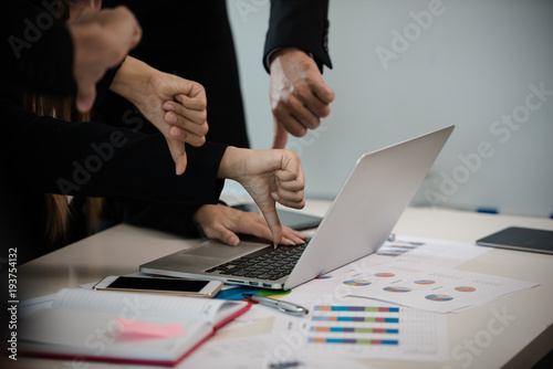 Photos Business man and women Show hand Disliked in business meeting..