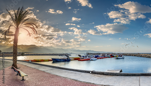 Morning on central promenade and stone walking pier in Eilat - the southernmo...