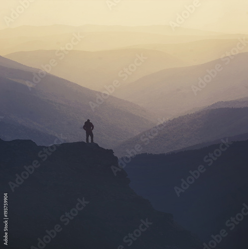 Hiker on the top of a mountain © Orlando Florin Rosu