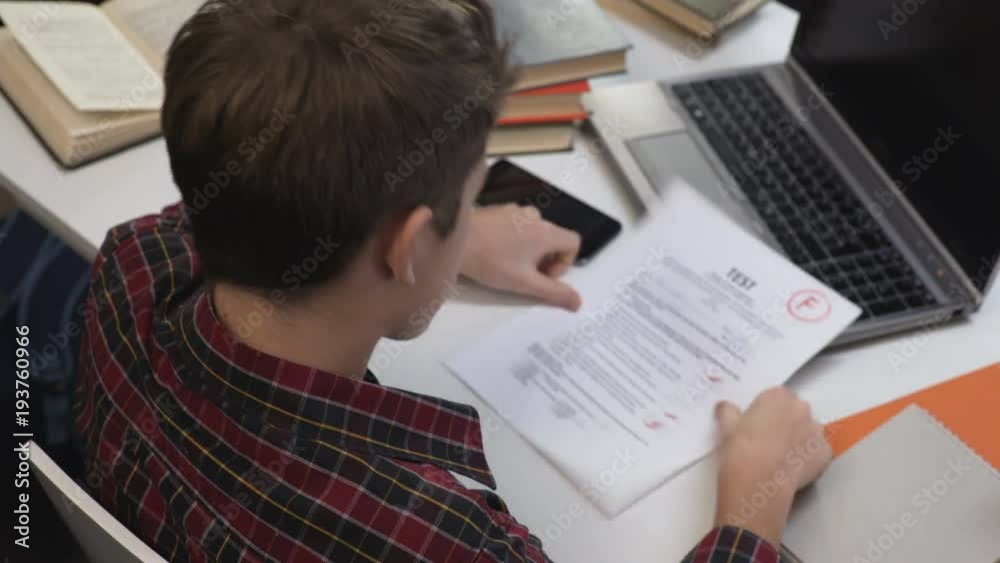 School pupil upset with bad mark for test, poor quality of education system School pupil upset with bad mark for test, poor quality of education system