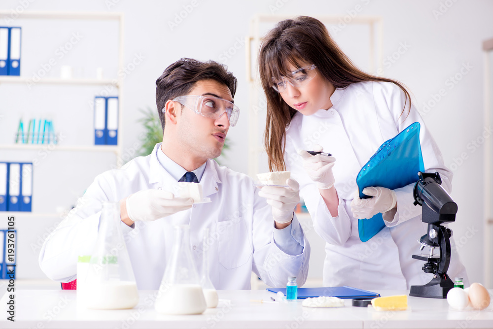 Two lab doctor testing food products Two lab doctor testing food products