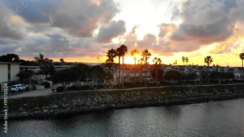Sunset reveal over coastal town