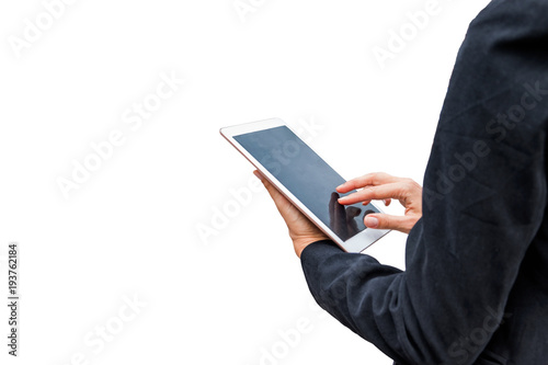 Businesswoman holding tablet and touching on blank display