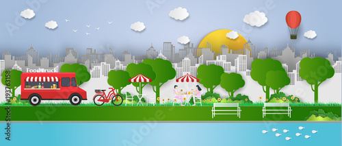 Creative ideas of Food Truck with opened street and fast food, truck with table.  Festival, Picnic, Cafe in public park.Outdoor recreation. paper art and digital craft style. vector Illustration