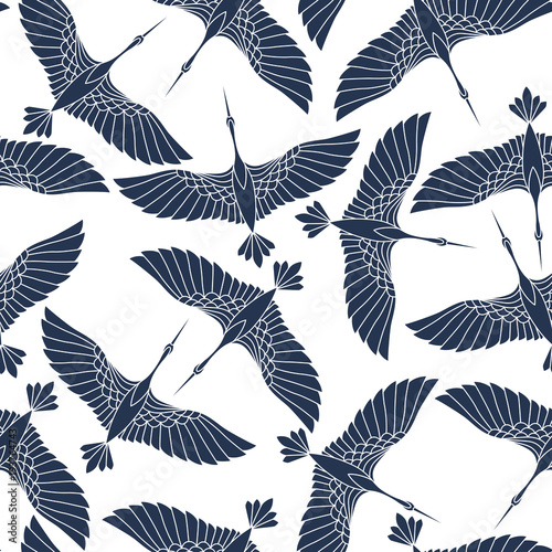 Japanese seamless pattern with beautiful cranes. Chinese vector background with flying birds. Ornament with oriental motives.