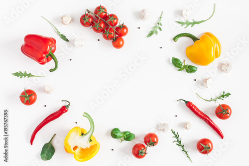 Fototapeta Naklejka Na Ścianę i Meble -  Healthy food on white background. Vegetables, tomatoes, peppers, green leaves, mushrooms. Flat lay, top view, copy space