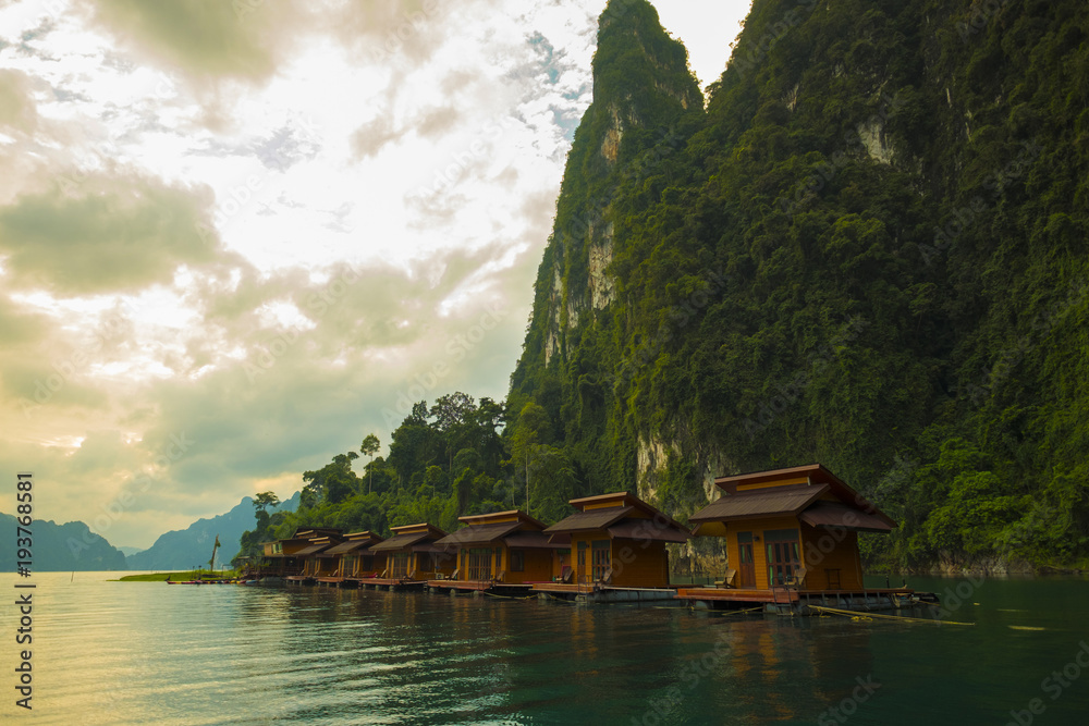 Fototapeta premium place for relax in the lake beside mountain at Rajjaprabha Dam, formerly known as Chiew Larn. Khao sok national park, suratthani of Thailand