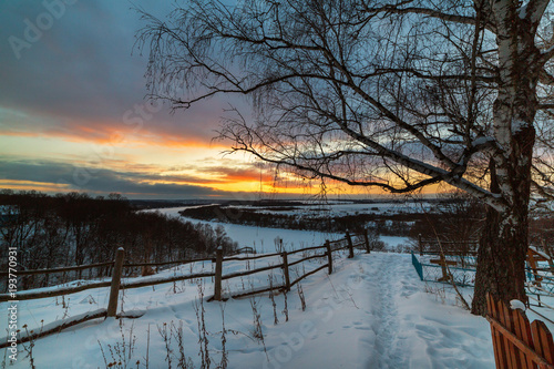 Winter sunset over an old graveyard