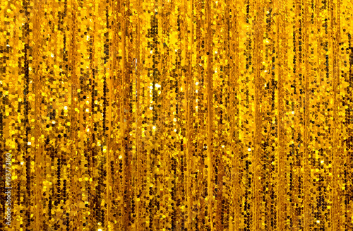 Abstract golden glitter curtain background photo