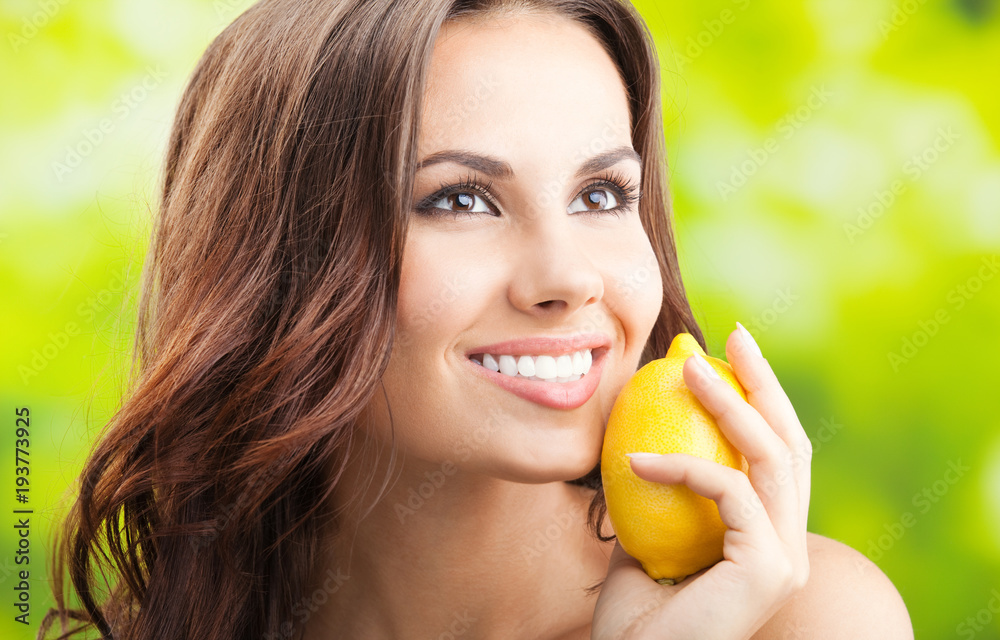 Young happy smiling woman with limon, outdoors Young happy smiling woman with limon, outdoors