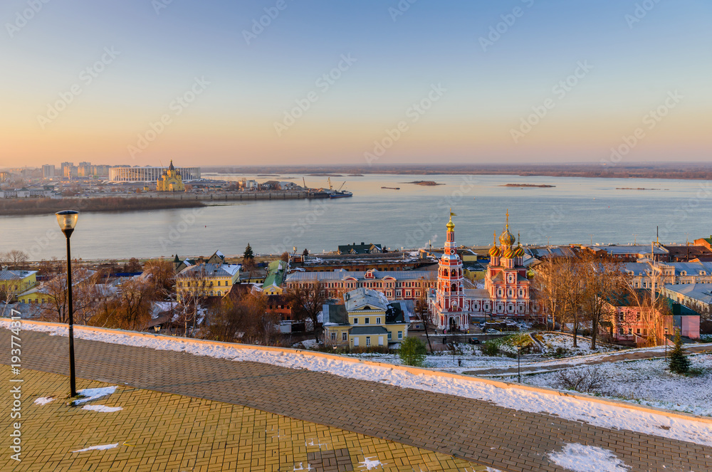 Beautiful panoramic view of the evening city near Kremlin with the Stroganov Church and Oka river, Nizhny Novgorod, Russia
