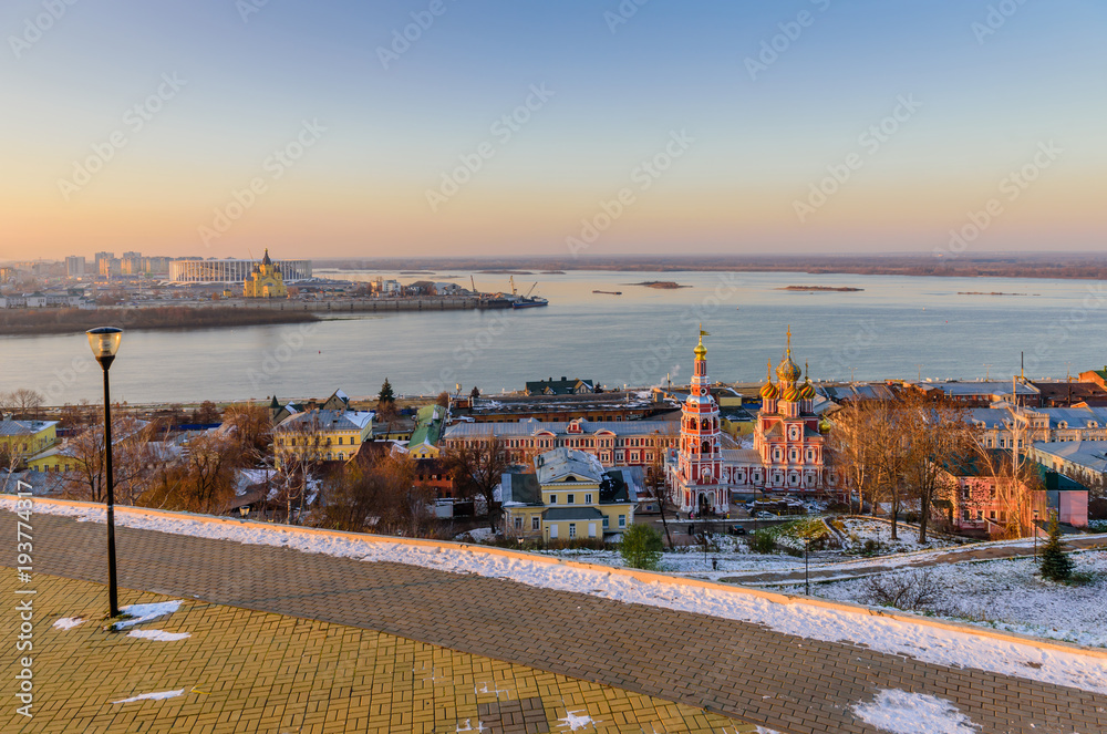 Fototapeta premium Beautiful panoramic view of the evening city near Kremlin with the Stroganov Church and Oka river, Nizhny Novgorod, Russia 