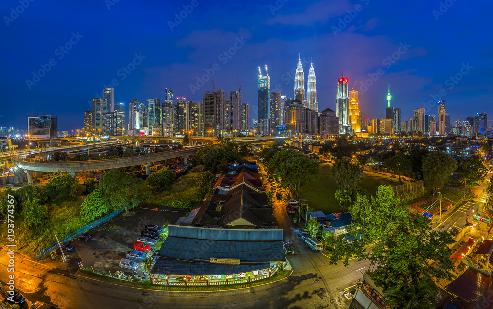 Fototapeta premium Kuala Lumpur urban and rural cityscape at sunset, Malaysia