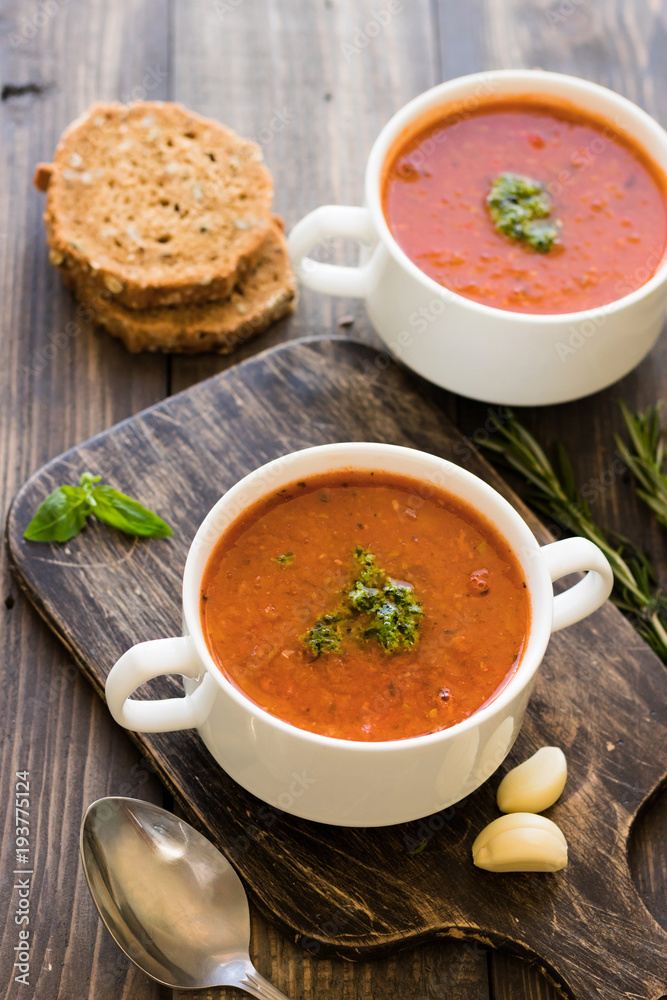 Thick Italian soup minestrone on a wooden table Thick Italian soup minestrone on a wooden table