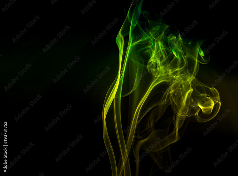 Obraz premium Colored smoke on black background