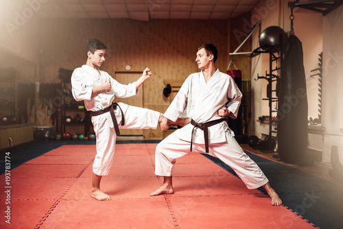 Martial arts masters, self-defence practice in gym