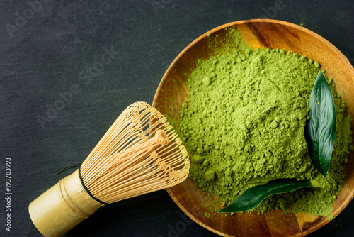 Japanese green tea matcha in a wooden bowl photo