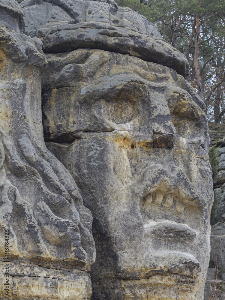 big face devils head sculpted in 19th century by Vaclav Levy to the sand stone rock in Zelizy, czech republic big face devils head sculpted in 19th century by Vaclav Levy to the sand stone rock in Zelizy, czech republic