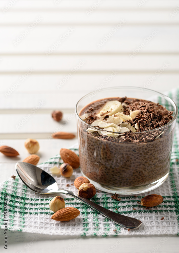chia pudding with chocolate banana smoothie in a glass jar on the old wooden background chia pudding with chocolate banana smoothie in a glass jar on the old wooden background