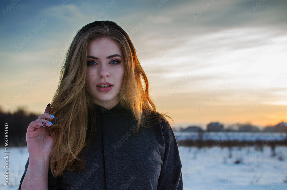 Young smiling girl in the winter Young smiling girl in the winter