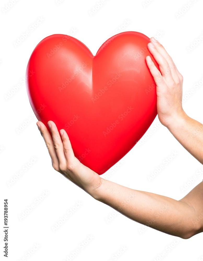 Hand holding Heart over isolated white background Hand holding Heart over isolated white background