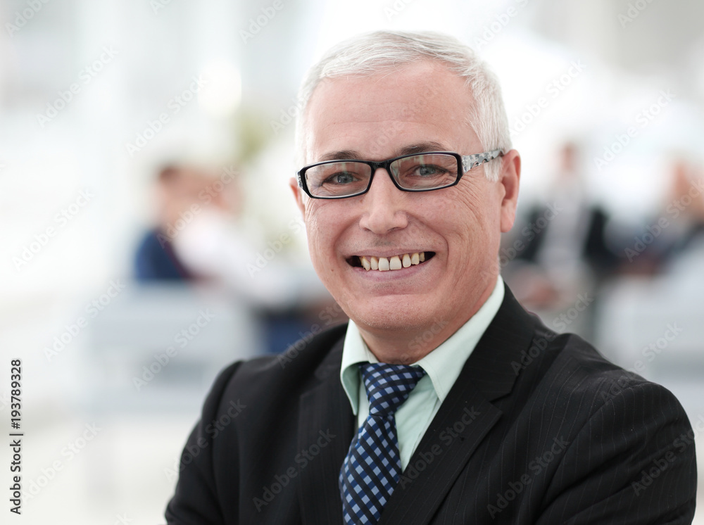 close up portrait of senior businessman in office