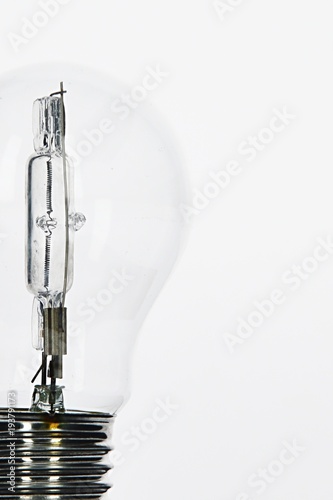 Wallpaper Mural Detail of halogen light bulb with vertically oriented internal element, Edison screw E27, light background Torontodigital.ca