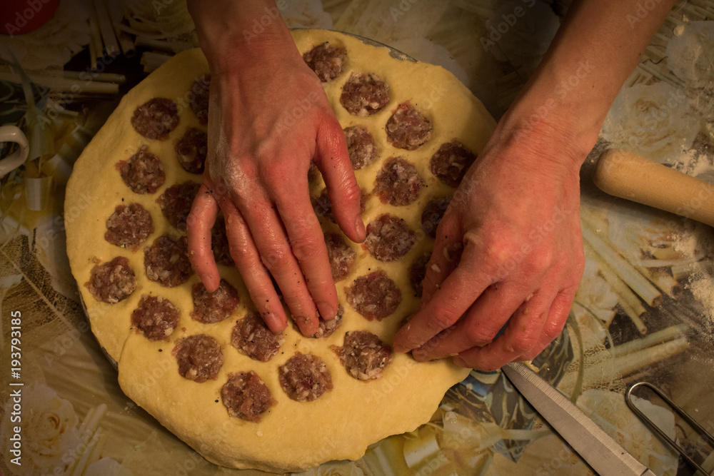 female hands preparing dumplings female hands preparing dumplings