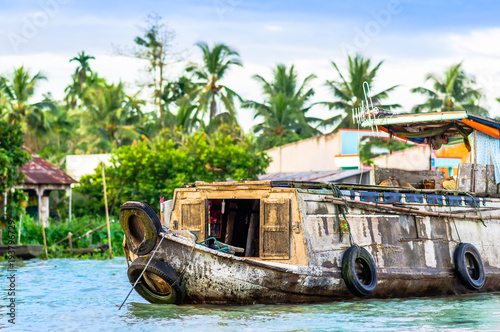 View on trading boat by Can Tho on floating market in Vietnam photo