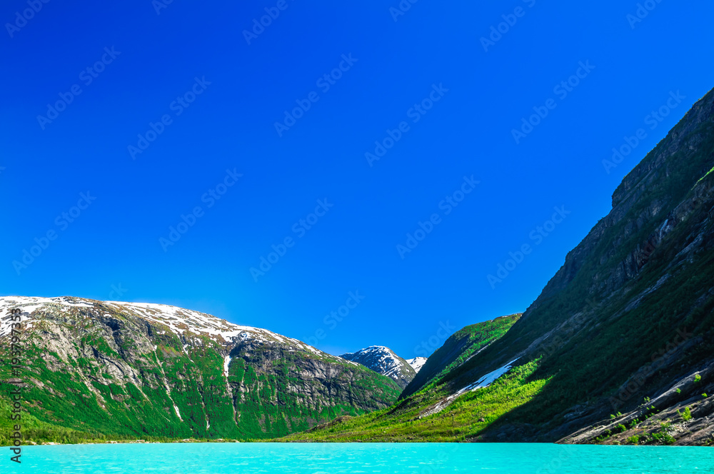 View on glacier lake by Nigardsbreen glacier in Norway