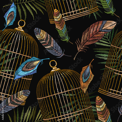 Embroidery golden bird's cages and feathers seamless pattern. Symbol of love, passion. Gold cages pattern. Fashionable clothes, t-shirt design. Clothes, t-shirt textile design template