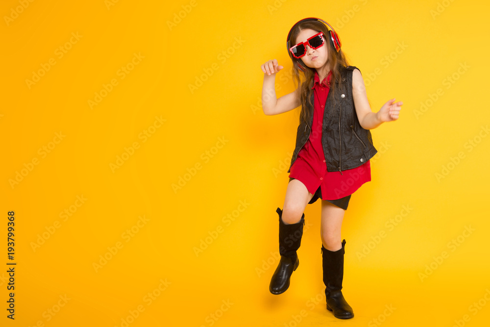 Little girl in headphones Little girl in headphones