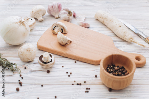 Mushrooms with different white ingredients on wooden table, top view and flat lay.