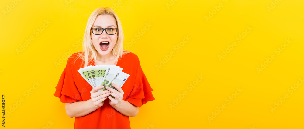 Blonde woman with cash