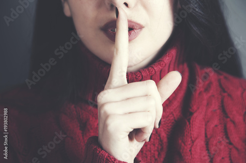woman finger in lip