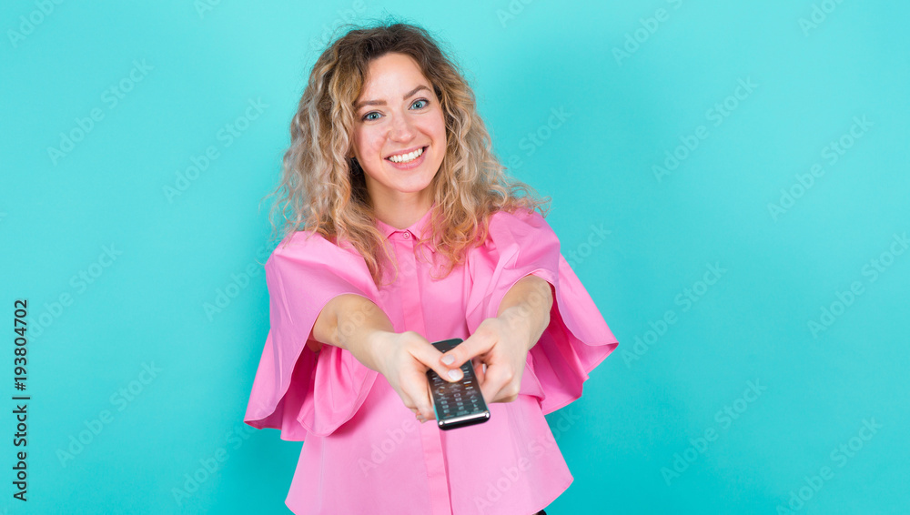 Attractive woman with remote control Attractive woman with remote control