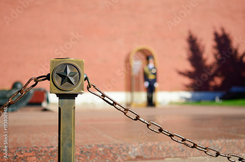Stylish view on Tomb of the Unknown Soldier and Eternal flame. War memorial, dedicated to Soviet soldiers killed during World War II. Located at the Kremlin Wall in the Alexander Garden.