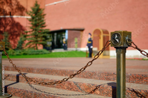 Stylish view on Tomb of the Unknown Soldier and Eternal flame. War memorial, dedicated to Soviet soldiers killed during World War II. Located at the Kremlin Wall in the Alexander Garden.