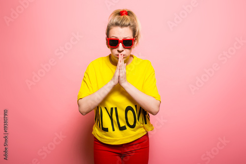 Blonde woman in bright clothes