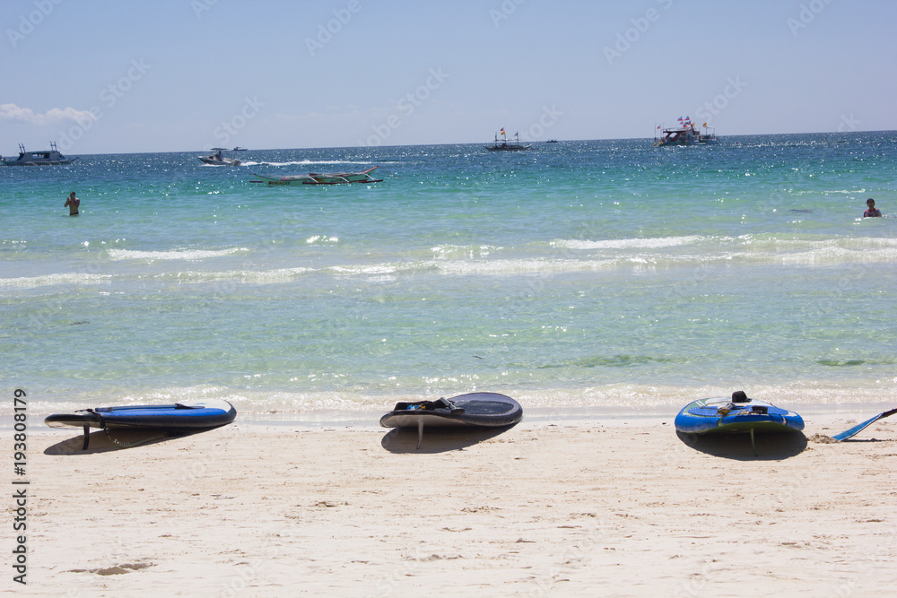 surfboards on the beach of the island Borakay, Philippines surfboards on the beach of the island Borakay, Philippines